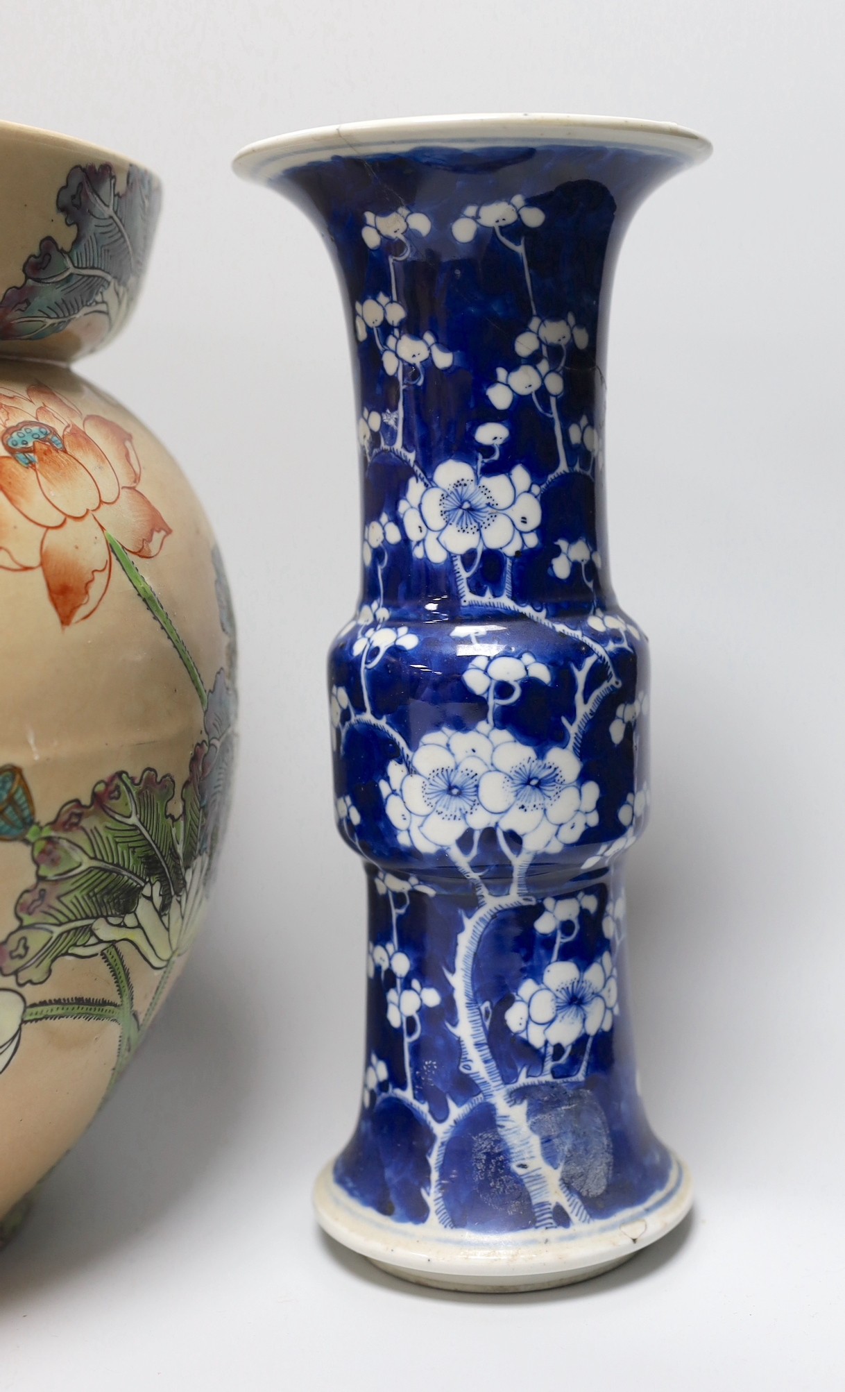 A Chinese blue and white gu vase, a baluster vase, a dish etc.